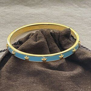 Coach Gold-Tone Bangle Bracelet with Turquoise Blue Enamel and Star Accents
